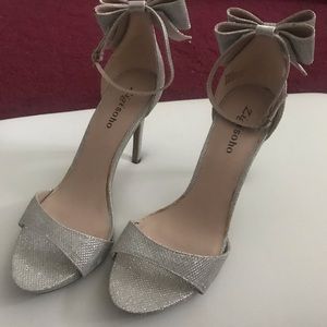 Wedding or prom! Silver heels never worn!